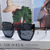 TRIOMPHE SUNGLASS 497831 IN BLACK ACETATE EMBOSSED LOGO