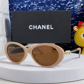 OVAL SUNGLASSES 640341 IN NUDE ACETATE METAL FRAME