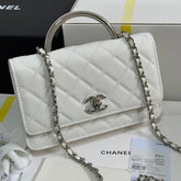 FLAP BAG WITH SILVER-TONE HANDLE 19 IN WHITE CAVIAR SKIN