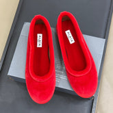 ALAIA 25S BALLET FLATS IN BRIGHT RED VELVET