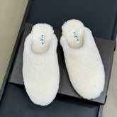 ALAIA 25S SHEARLING COZY SLIPPERS IN WHITE