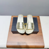 ALAIA FLAT SANDALS WITH PERFORATED STRAPS 25S IN GOLD LAMBSKIN