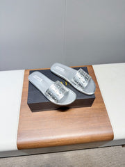 ALAIA FLAT SANDALS WITH PERFORATED STRAPS 25S IN SILVER LAMBSKIN