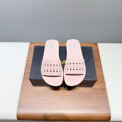 ALAIA FLAT SANDALS WITH PERFORATED STRAPS 25S IN LIGHT PINK SUEDE