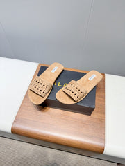 ALAIA FLAT SANDALS WITH PERFORATED STRAPS 25S IN BEIGE SUEDE