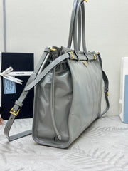 PRADA 25S LUX SOFT BAG 42 IN GRAY GLOSSY CALFSKIN GOLD HARDWARE