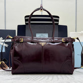 PRADA 25S BONNIE LARGE HANDBAG 38 IN BURGUNDY GLOSSY CALFSKIN GOLD HARDWARE