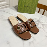 INTERLOCKING G SLIDE SANDAL IN BROWN BEIGE CALFSKIN