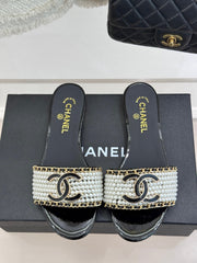 CC SLIDE SANDALS IN BLACK AND WHITE PEARL