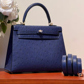 KELLY SELLIER 25 BAG IN NAVY BLUE OSTRICH LEATHER WITH GOLD HARDWARE