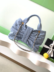 CHANEL 25S MAXI BOW BAG 38 IN BLUE DENIM WITH GOLD HARDWARE