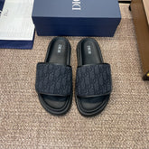 DIOR 25S ALIAS SLIDES IN BLACK CALFSKIN WITH CD OBLIQUE DARK BLUE LOGO