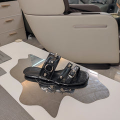 STRAPPY FLAT SANDALS IN BLACK STUDDED WAX-OIL SHEEPSKIN