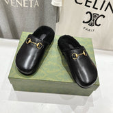 HORSEBIT MULE IN BLACK CALFSKIN AND FLEECE LINING