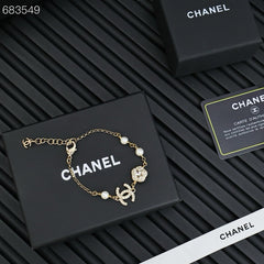 CC BRACELET 25P IN GOLD METAL PEARLY WHITE AND CRYSTAL