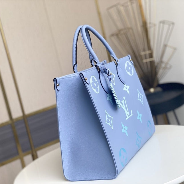 ONTHEGO MM 35CM SUMMER BLUE EMBOSSED GRAINED COWHIDE