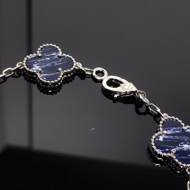 CLOVER 5 MOTIF PIETERSITE SILVER BRACELET