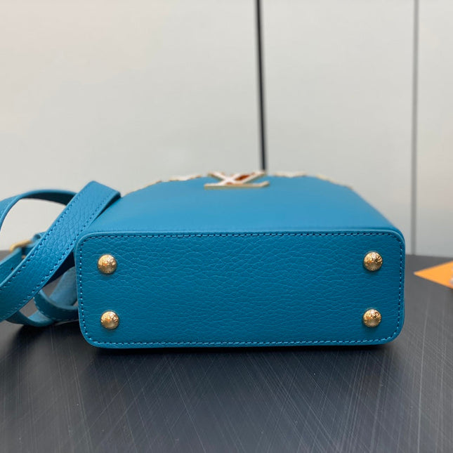 CAPUCINES MINI 21 BLUE TAURILLON GOLD  HARDWARE