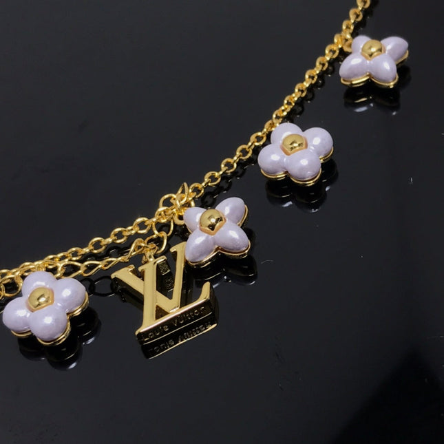 LV LOGO 6 MOTIF STAR AND SUN GOLD BRACELET