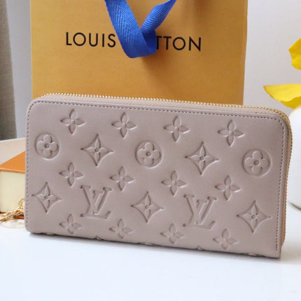 ZIPPY WALLET 19 BEIGE EMBOSSED LAMBSKIN