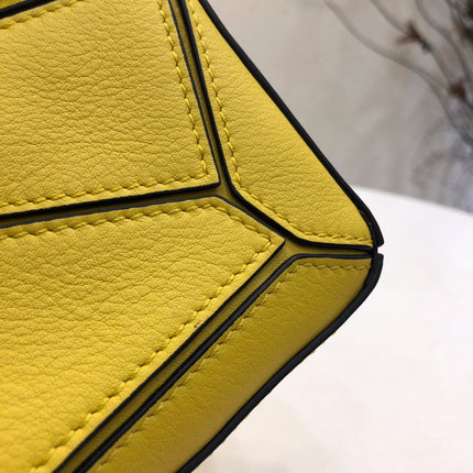 LOE MINI 18 PUZZLE BAG IN YELLOW CALFSKIN