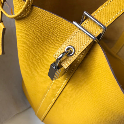 HM PICOTIN LOCK 18 YELLOW CALFSKIN WITH BRAID STRAP