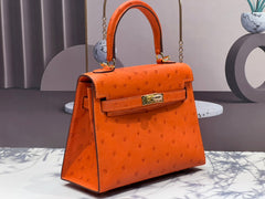 KELLY BAG 20 IN FIRE ORANGE OSTRICH LEATHER WITH GOLD HARDWARE