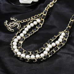 CHANEL 25S CHAIN BELT IN WHITE PEARL AND BLACK CALFSKIN 612711