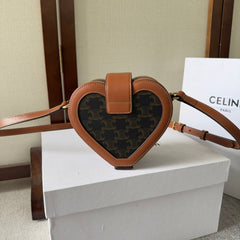 HEART TAMBOUR BAG 15 IN BLACK TRIOMPHE CANVAS AND BRONZE BROWN CALFSKIN