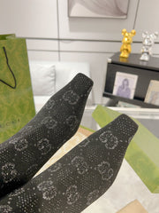 ANKLE BOOTS IN BLACK KNITTED FABRIC