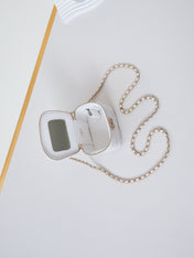 CHANEL 25S MINI VANITY BAG 11 CM IN WHITE LAMBSKIN WITH CRYSTAL-EMBELLISHED CC LOGO