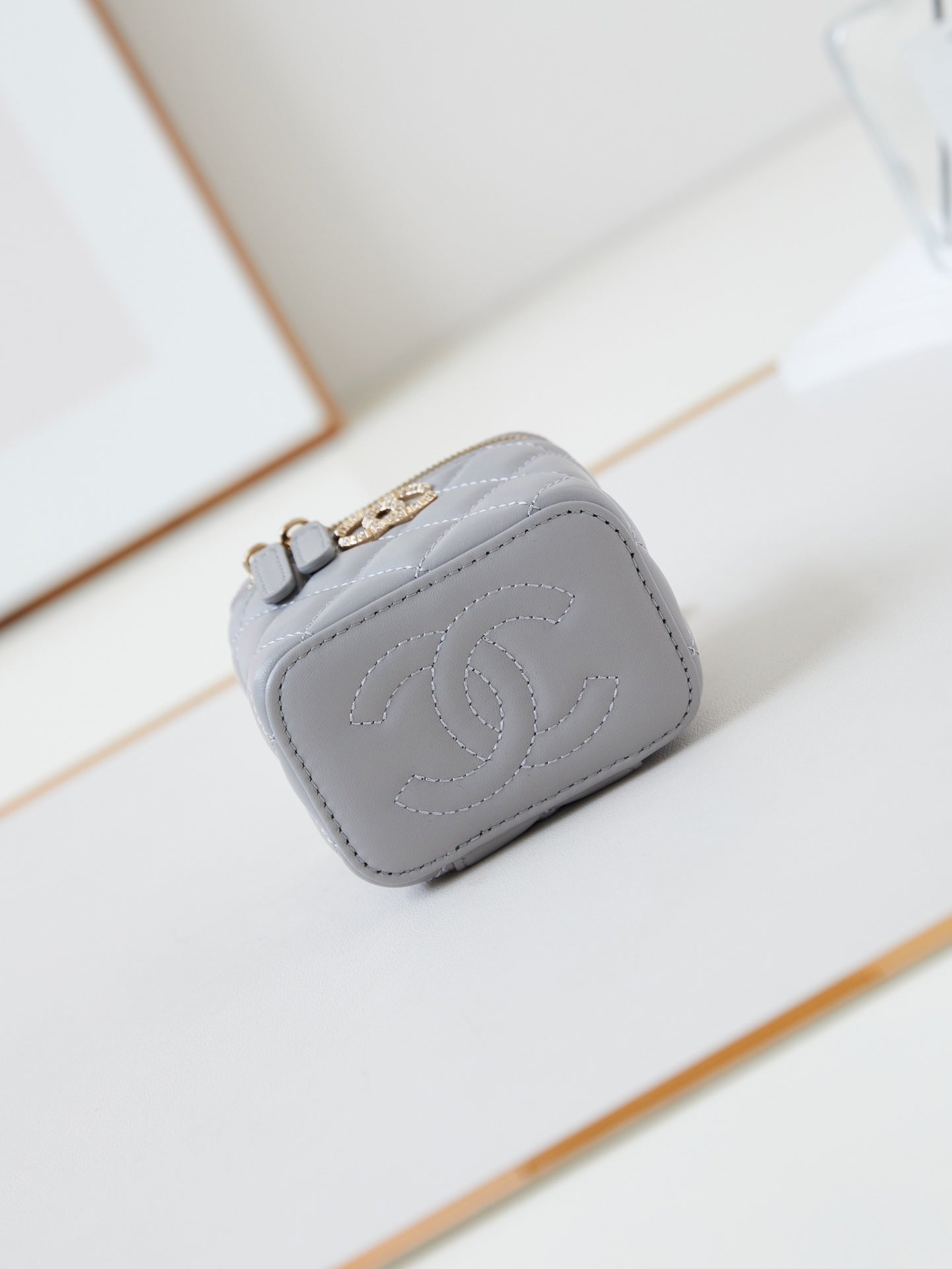 CHANEL 25S MINI VANITY BAG 11 CM IN GREY LAMBSKIN WITH CRYSTAL-EMBELLISHED CC LOGO