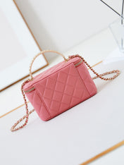 CHANEL 25S MINI VANITY BAG 16 CM IN PEACHY PINK LAMBSKIN WITH CRYSTAL-EMBELLISHED CC LOGO