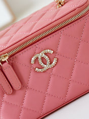 CHANEL 25S MINI VANITY BAG 16 CM IN PEACHY PINK LAMBSKIN WITH CRYSTAL-EMBELLISHED CC LOGO
