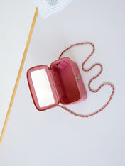 CHANEL 25S MINI VANITY BAG 16 CM IN PEACHY PINK LAMBSKIN WITH CRYSTAL-EMBELLISHED CC LOGO