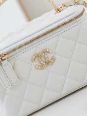 CHANEL 25S MINI VANITY BAG 16 CM IN WHITE LAMBSKIN WITH CRYSTAL-EMBELLISHED CC LOGO
