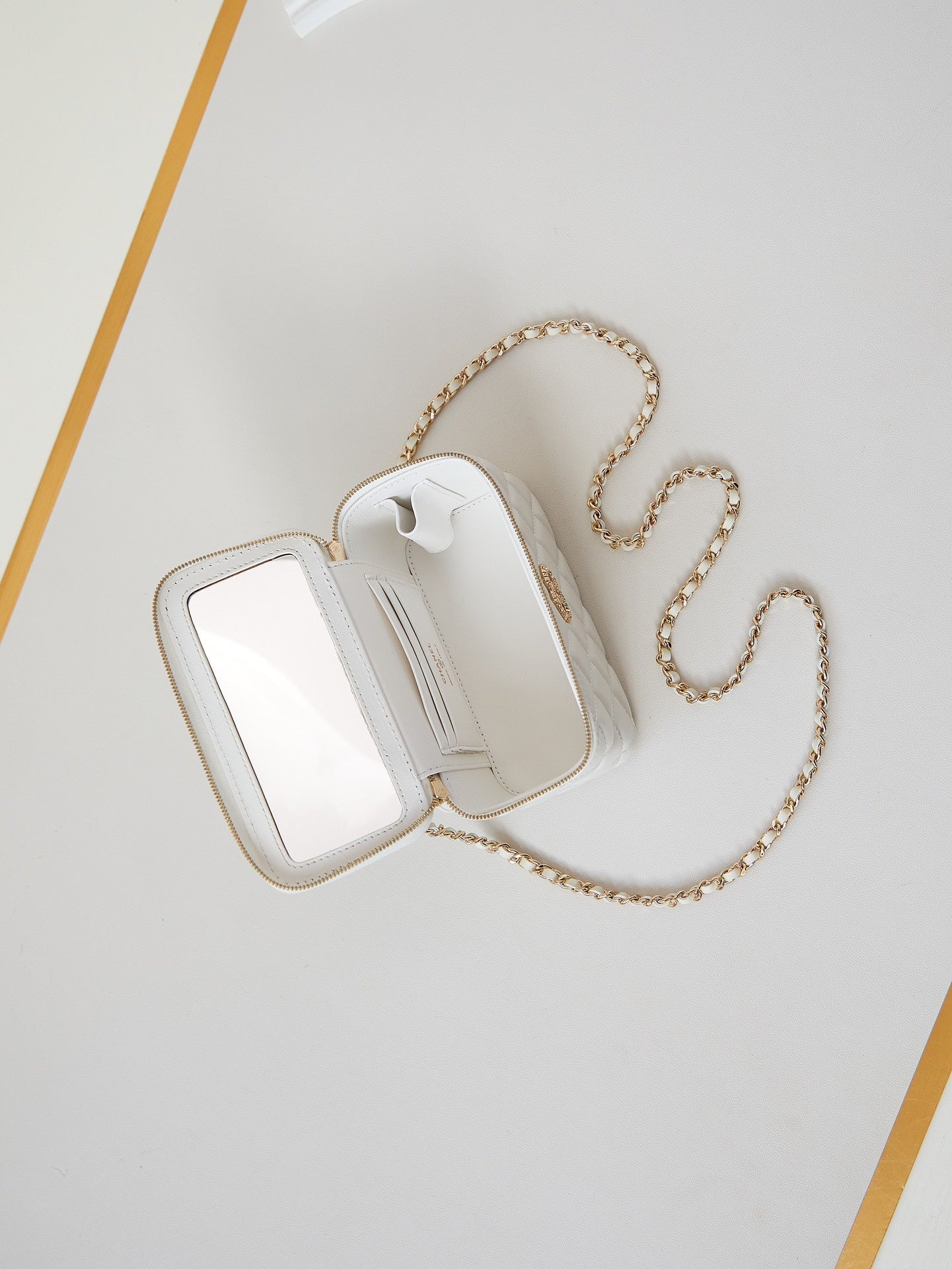 CHANEL 25S MINI VANITY BAG 16 CM IN WHITE LAMBSKIN WITH CRYSTAL-EMBELLISHED CC LOGO