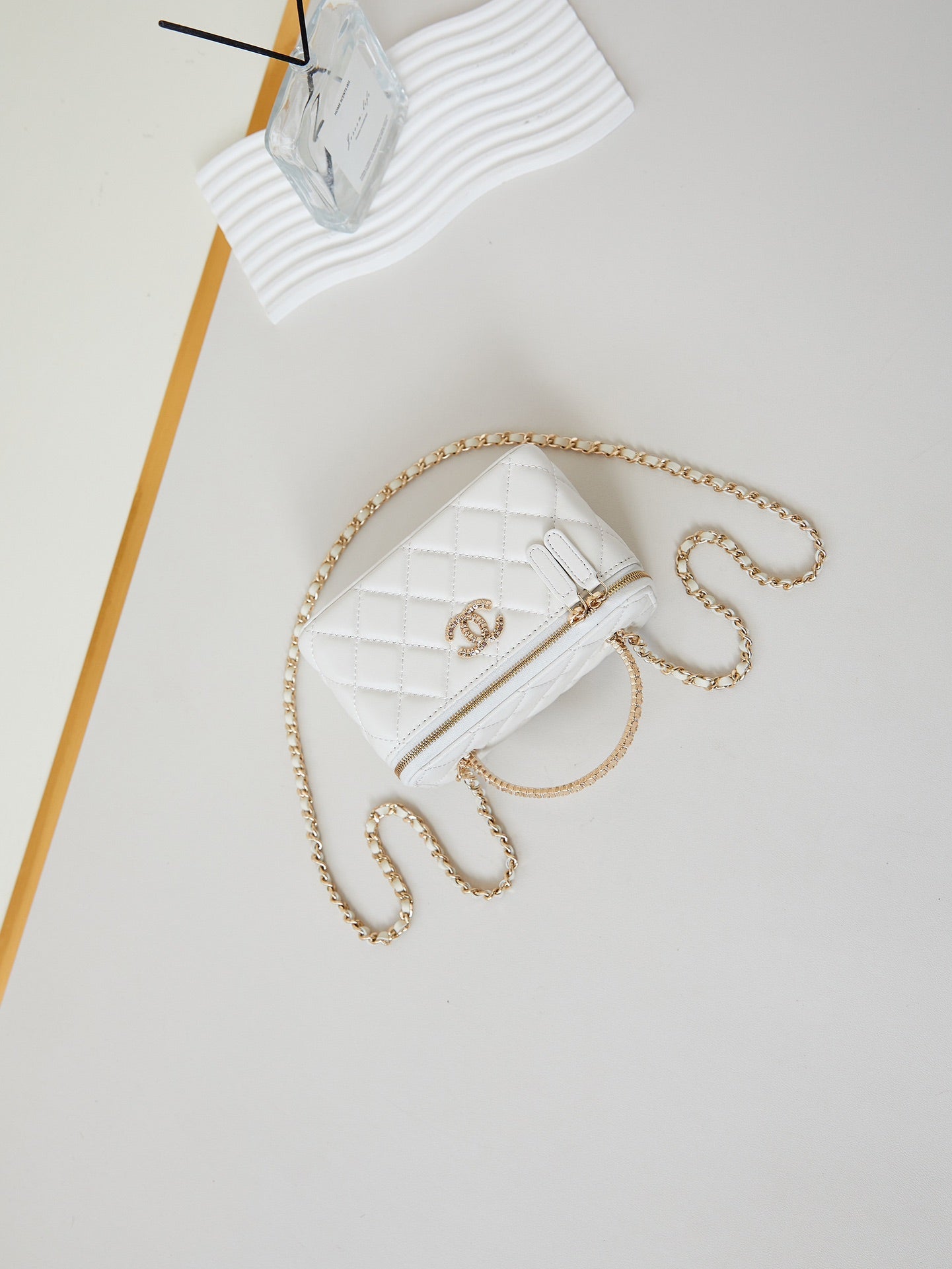 CHANEL 25S MINI VANITY BAG 16 CM IN WHITE LAMBSKIN WITH CRYSTAL-EMBELLISHED CC LOGO