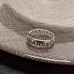 CC  RING LETTER DOUBLE C IN SILVER DIAMOND BLACK EMBOSSED LOGO