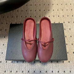 BOTTEGA VENETA 26S FLAT MULES IN DARK RED LAMBSKIN