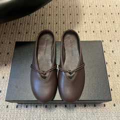 BOTTEGA VENETA 26S FLAT MULES IN DARK BROWN LAMBSKIN