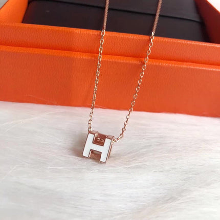 H WHITE SQUARE PINK GOLD NECKLACE