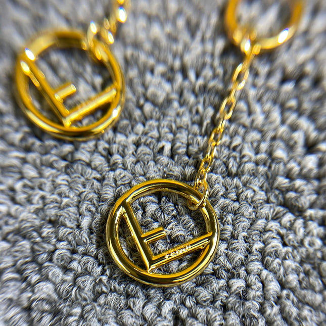 F DROP GOLD EARRINGS