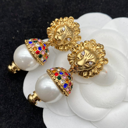 GG LION HEAD PEARL COLORED DIAMOND EARRINGS