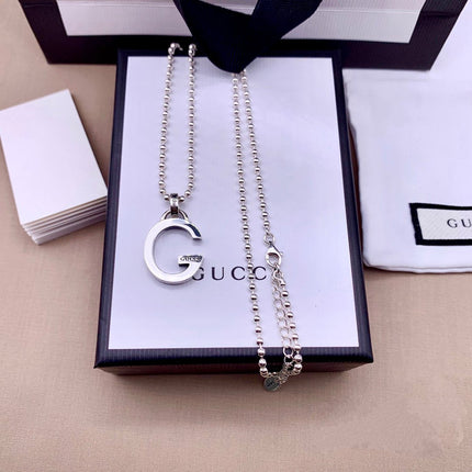 STERLING SILVER LETTER DOUBLE G LOGO PENDANT VERSATILE NECKLACE