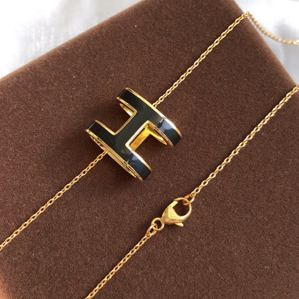 HM CLIC BLACK ENAMEL GOLD NECKLACE