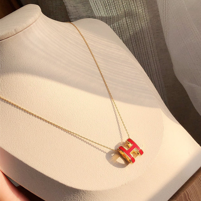 HM CLIC RED ENAMEL GOLD NECKLACE