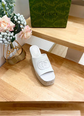 HIGH 10CM WEDGE SANDALS IN WHITE SHEEPSKIN