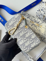 DIOR 25S TRAVEL MYRTE ZIPPED KEY CASE 14 IN GRAY DIOR OBLIQUE JACQUARD CANVAS