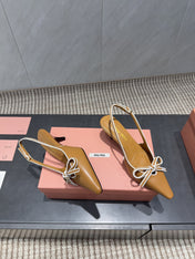 MIUMIU 26S SLINGBACK 55MM IN CARAMEL BROWN CALFSKIN WITH BOW